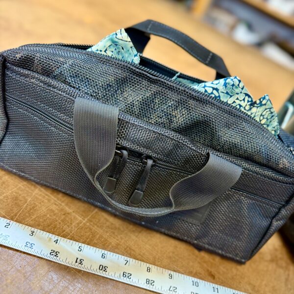 Giles Bag in black mesh fabric.