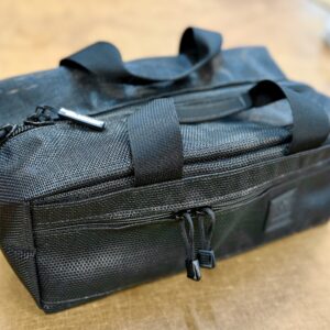 Shoebox Duffel in black mesh fabric.